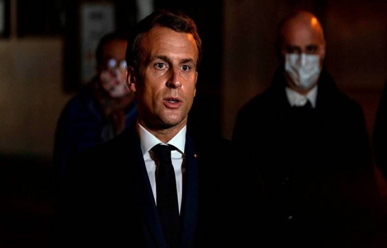 Virus to stay &#039;at least until next summer: Emmanuel Macron