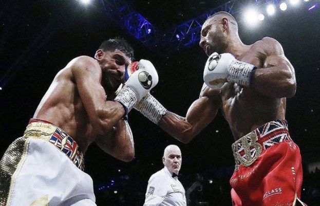 Amir Khan knocked out by Kell Brooks in crucial boxing fight