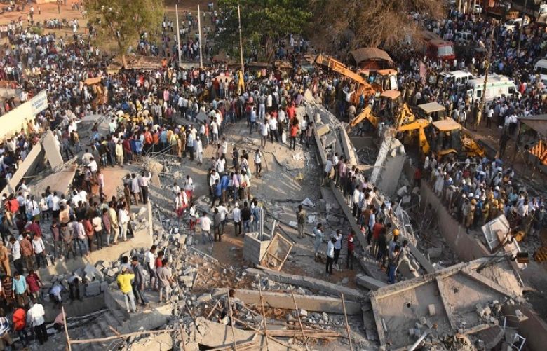 Two people died under rubble after a building site collapsed Tuesday in India