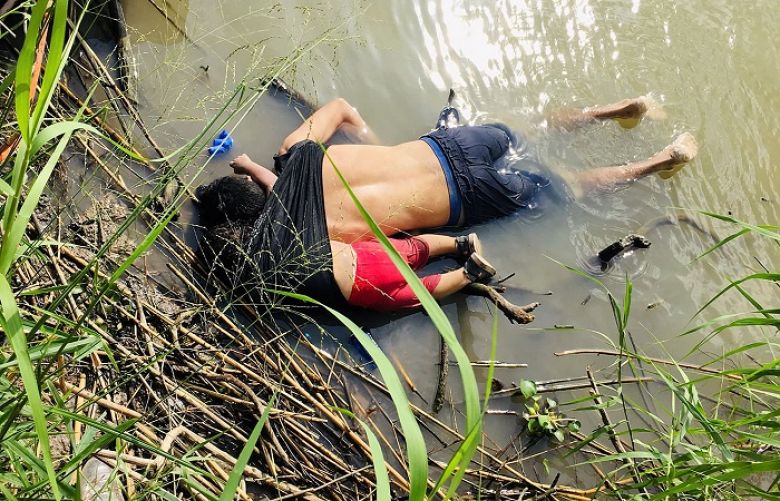 The bodies of Salvadorian migrant Oscar Alberto Martinez Ramirez and his daughter Valeria are seen after they drowned in the Rio Bravo river.