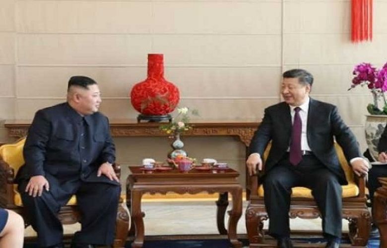 Chinese President Xi Jinping and North Korean Leader Kim Jong Un