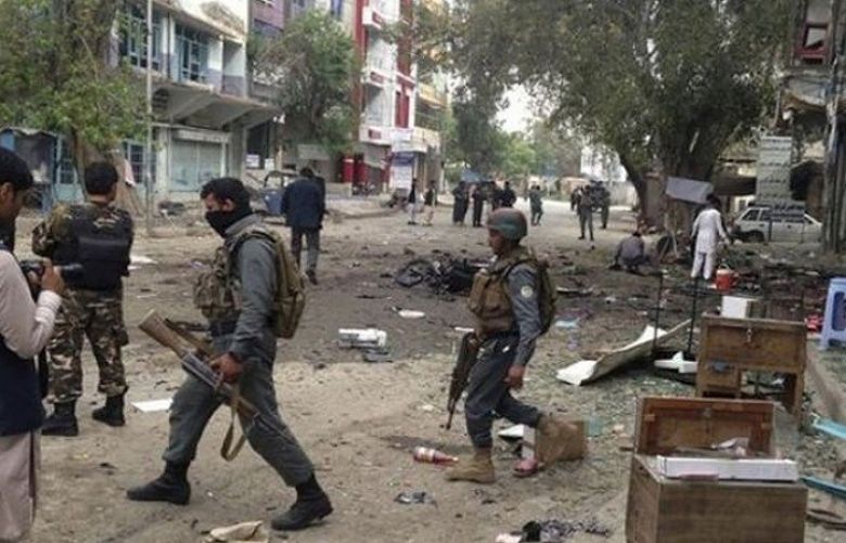 At least 17 dead as bomb, gun battle rages in Afghan city