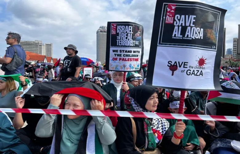 Protesters in Kuala Lumpur have labelled Israel a terrorist state.