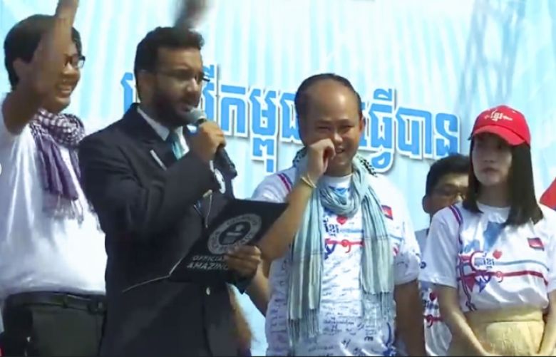 Cambodia earns Guinness Record for longest woven scarf