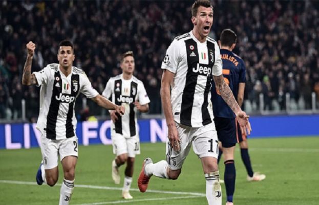 Mandzukic fires Juventus into Champions League last 16