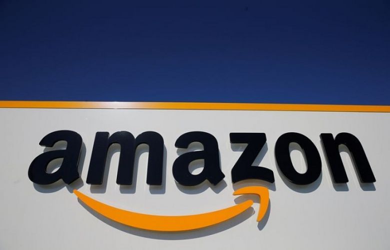  The logo of Amazon is seen at the company logistics center in Lauwin-Planque, northern France