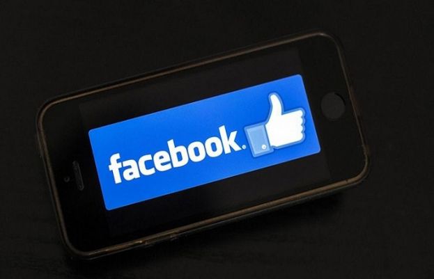 In this file photo taken on January 15, 2019, the logo of social network Facebook is displayed on a smartphone in Nantes, France.