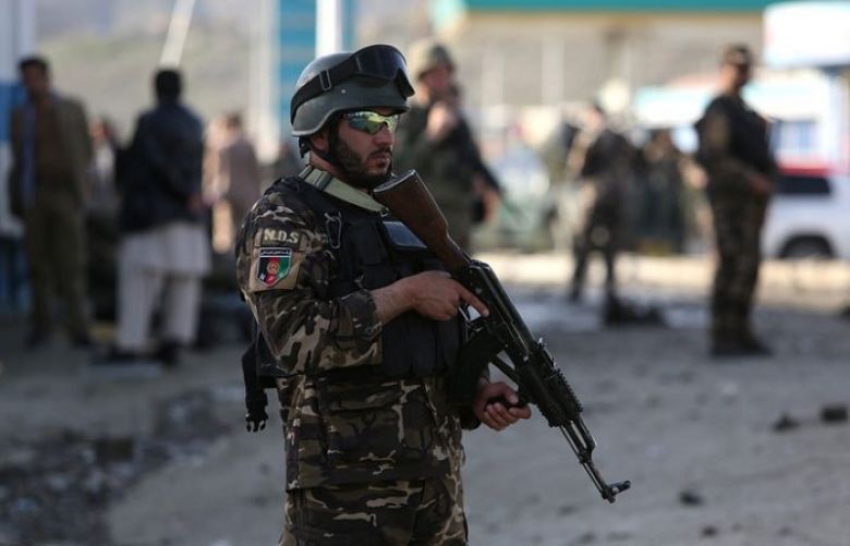 Taliban soldier standing on sight of incident