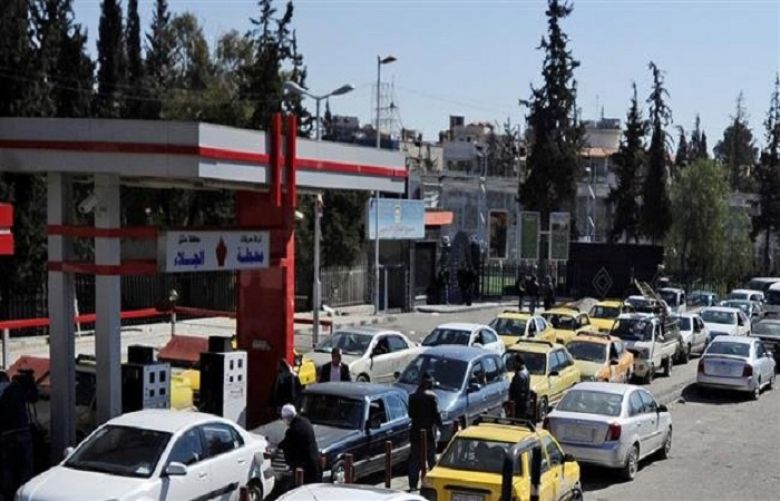 Vehicles queue for petrol at a gas station in Damascus, Syria , February 19, 2017. 