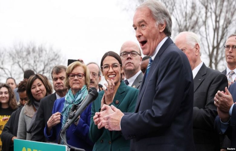 FILE - Sen. Ed Markey, D-Mass., and Rep. Alexandria Ocasio-Cortez, D-N.Y., hold a news conference for their proposed &quot;Green New Deal&quot; at the U.S. Capitol in Washington, Feb. 7, 2019. The Republican-led Senate rejected the plan March 26, 2019.