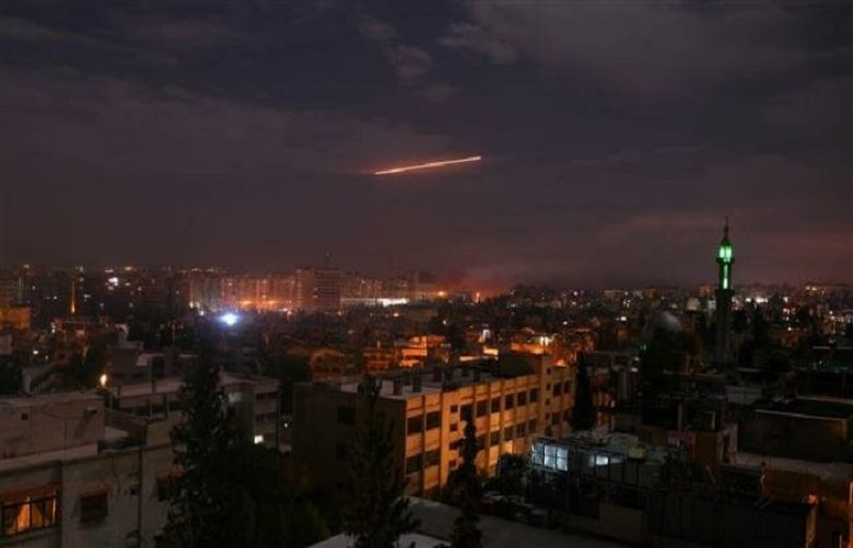 Syrian air defenses confront Israeli attacks