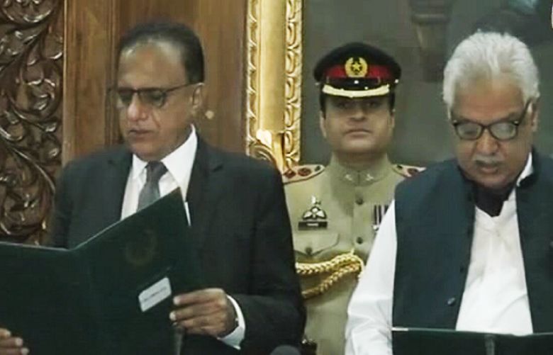 Former Justice Dost Muhammad Khan taking oath as KP CM