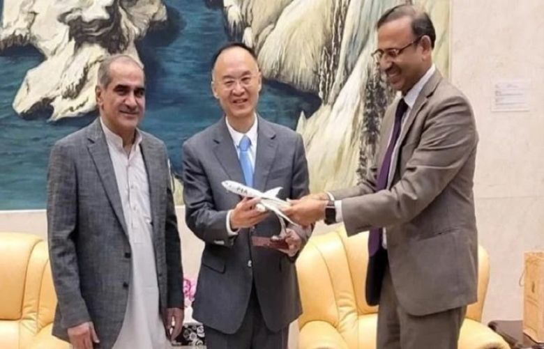 Chinese Ambassador to Pakistan Nong Rong and Railway Minister Khawaja Saad Rafique.