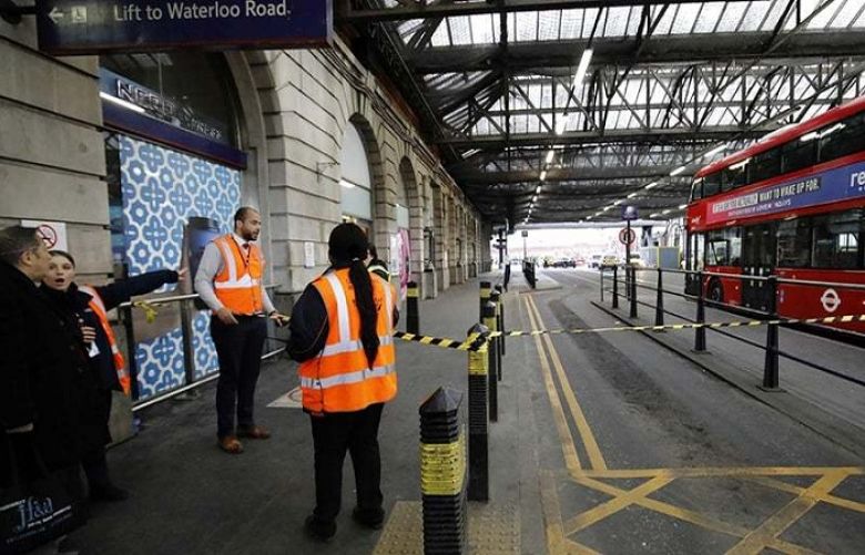 Security personel stand guard outside a police cordon at Waterloo Station, central London on March 5, 2019, following a report of a suspicious package at the station.