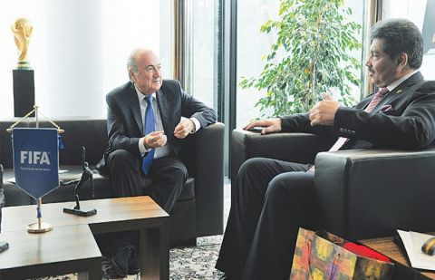 Faisal Saleh Hayat meets FIFA president Sepp Blatter during his visit to the FIFA House in Zurich in June.