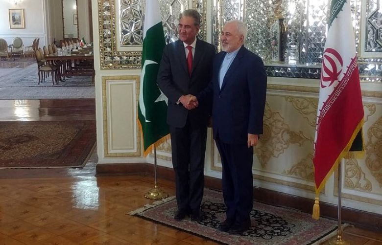 Foreign Minister Shah Mahmood Qureshi and Iranian Foreign Minister Javad Zarif