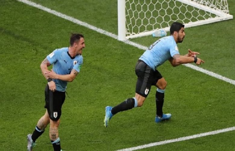 Suarez sends Uruguay into last 16 after 1-0 victory over Saudi Arabia