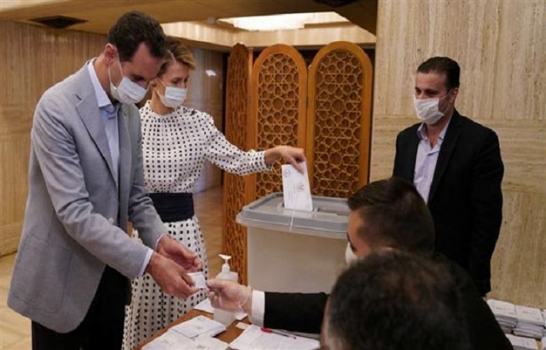 Bashar al-Assad and Wife casting vote