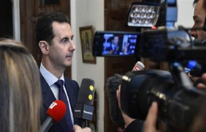 Syrian President Bashar al-Assad speaking to media