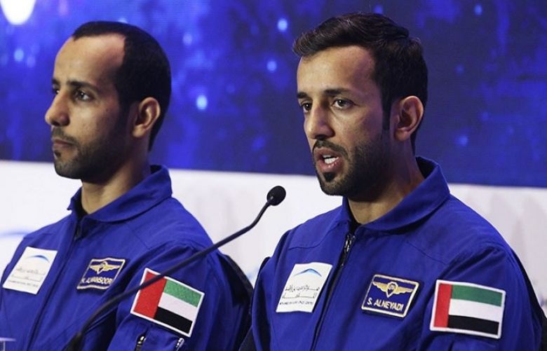 Emirati astronaut Sultan al-Neyadi, right, speaks to journalists with astronaut Hazza al-Mansoori, in Dubai, United Arab Emirates on Monday.