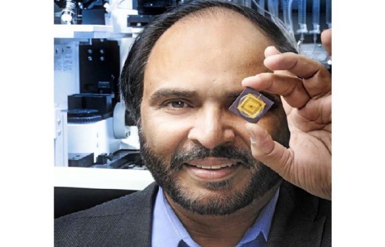 Dr Naweed Syed with his pioneering two way cyborg chip.