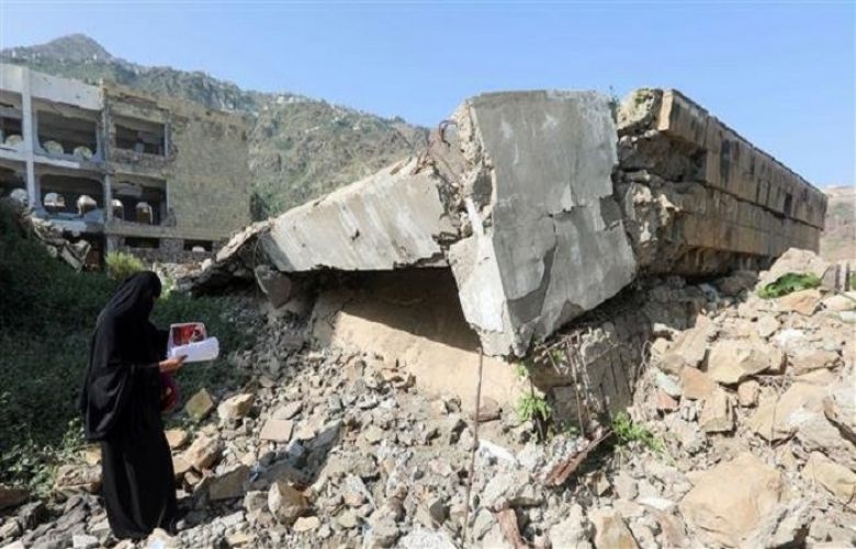 A Yemeni member of a school administration inspects the damage on the first day of the new academic year on September 16, 2018, at a school that was damaged last year in a Saudi airstrike in the country&#039;s third-city of Ta&#039;izz.