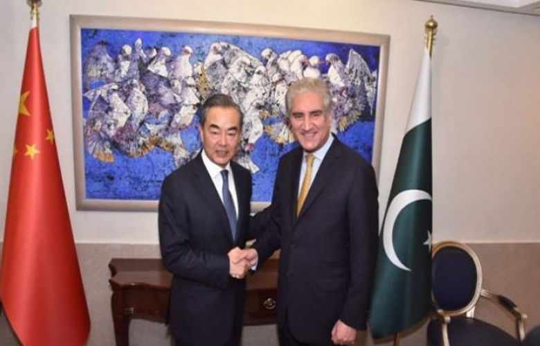 Chinese State Councilor and Foreign Minister Wang Yi  meets his pakistani counterpart Shah Mehmood Qureshi.