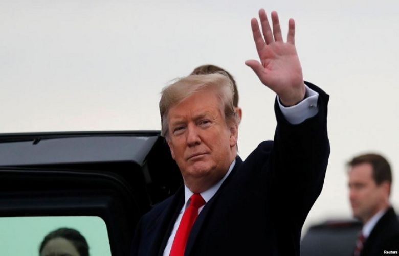 U.S. President Donald Trump waves as he arrives at Akron-Canton airport in Canton, Ohio, March 20, 2019.