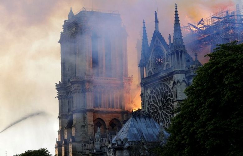 Flames engulfed the Notre-Dame Cathedral in central Paris