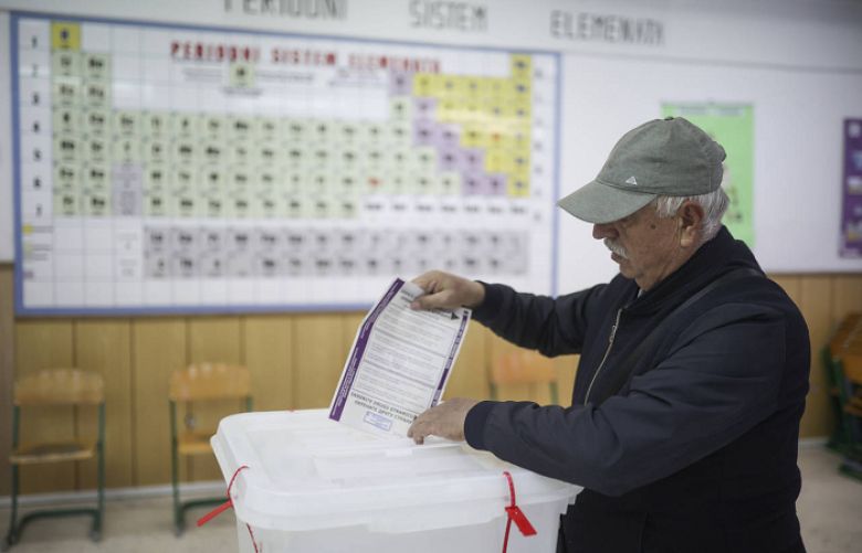 Bosnia begins voting in presidential, parliamentary elections.