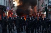 Tensions flare again in Paris as France counts cost of worst unrest in years