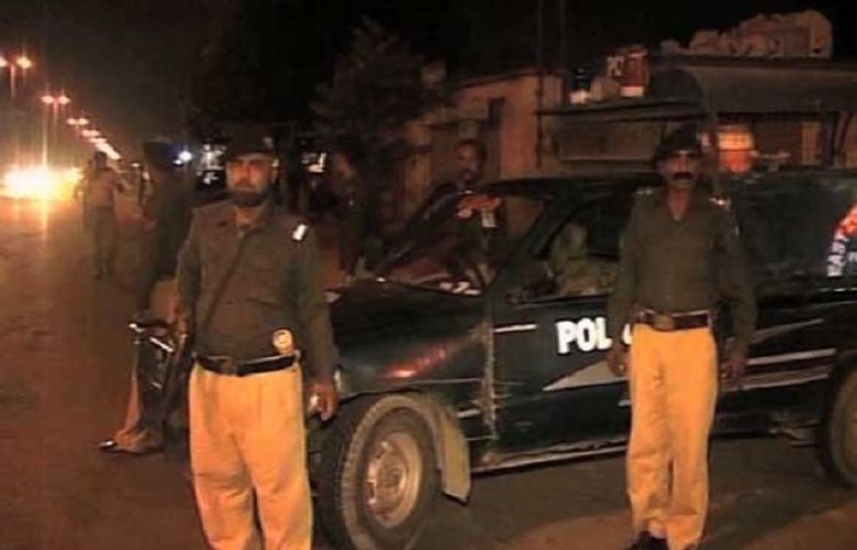 Man, wife injured in crossfire between police, suspects in Karachi