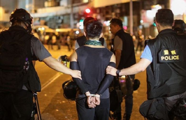Hong Kong police arrest four under new security law