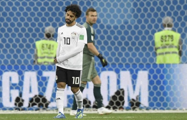 Russia sour Salah&#039;s return to close in on last 16