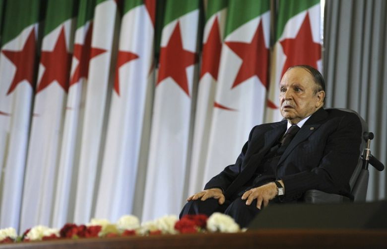 FILE - In this April 28, 2014 file photo, Algerian President Abdelaziz Bouteflika sits in a wheelchair after taking oath as President, in Algiers. Algeria&#039;s powerful army chief said Tuesday March 26, 2019 that he wants to trigger the constitutional process that would declare President Abdelaziz Bouteflika unfit for office, after more than a month of mass protests against the ailing leader&#039;s long rule. 