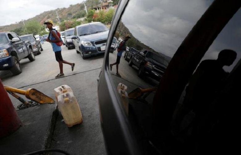 Soldiers oversee fuel rationing in some Venezuelan towns amid shortages