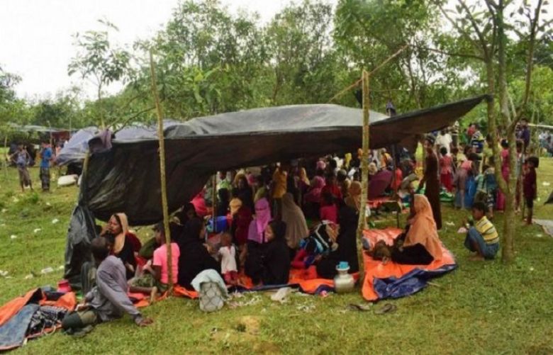 refugees arrive in Bangladesh from Myanmar