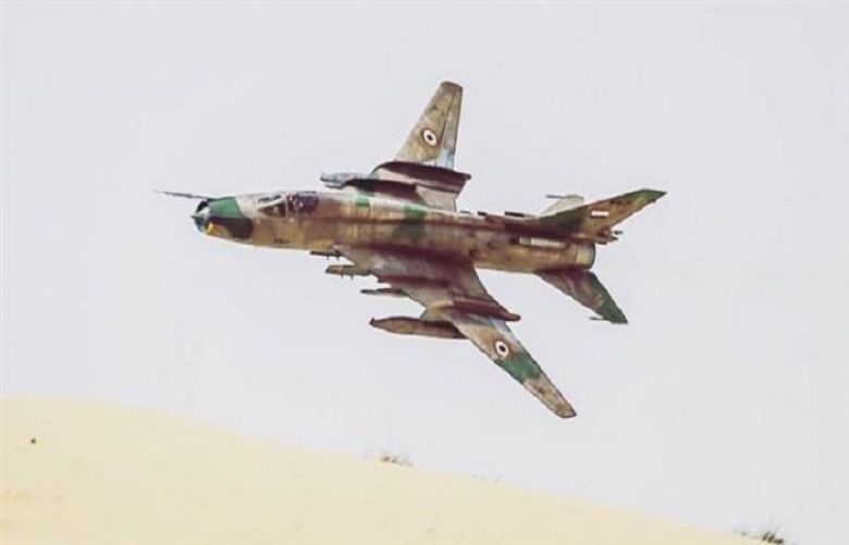 This file picture shows a Syrian Air Force Sukhoi Su-22 fighter jet in flight.