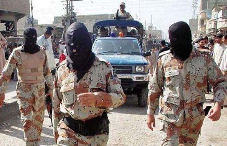 Rangers arrest 15 suspects during raids in Karachi