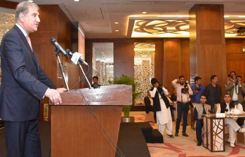 Foreign Minister Shah Mehmood Qureshi addressing a news conference in Kuwait