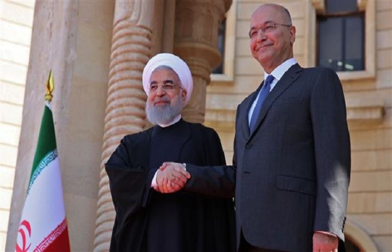 Iranian President Hassan Rouhani and his Iraqi counterpart, Barham Salih