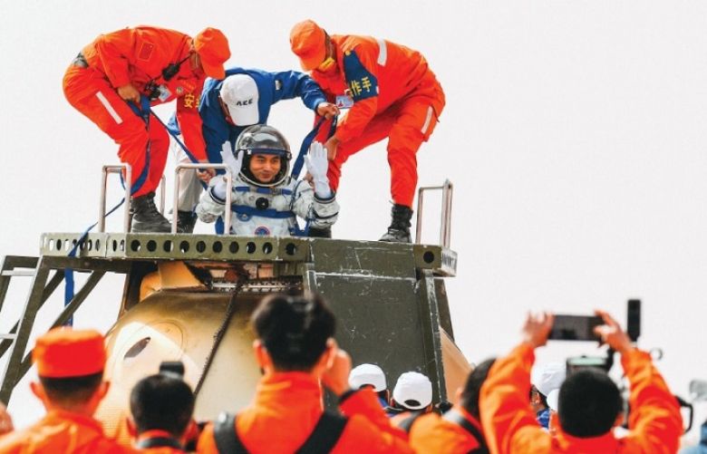 Three Chinese astronauts return to Earth after six months