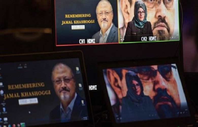 In this AFP file photo taken on November 2, 2018 Hatice Cengiz, the fiancee of the late Washington Post journalist Jamal Khashoggi, delivers a prerecorded message (upper R) during a remembrance ceremony for her fiancée in Washington, DC.