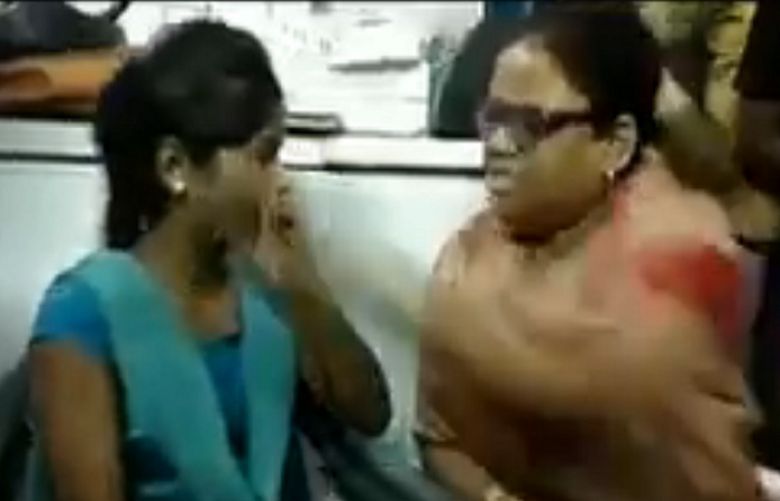 BJP local leader Sangeeta Varshney slapping a girl.