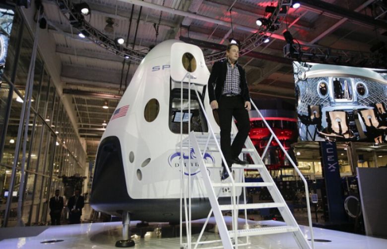 First commercial space taxi a pit stop on Musk’s Mars quest