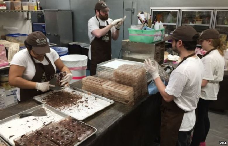 A team of workers make hand-crafted caramels in small batches at the Chouquette kitchen just outside Washington. 