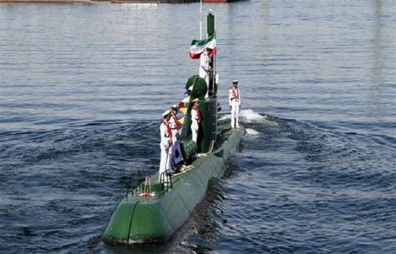  Iran’s navy members stand on Ghadir-942 submarine in southern port of Bandar Abbas