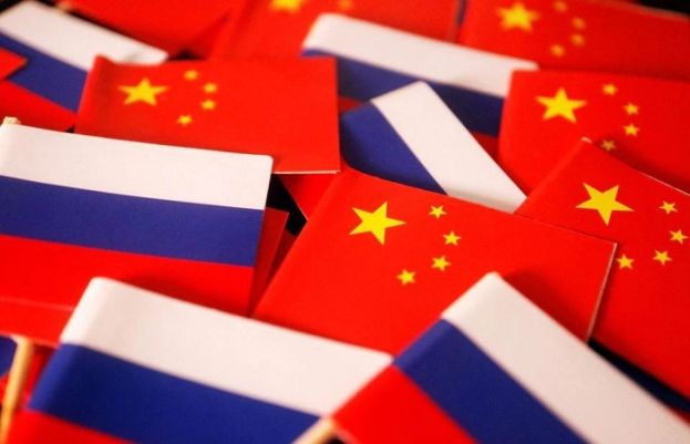 China, Russia 'more determined' to boost ties