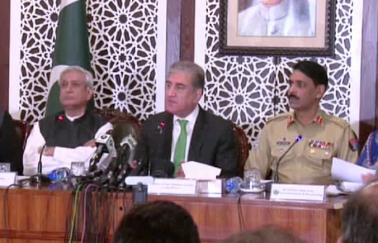 Foreign Minister Shah Mehmood Qureshi addressing a joint press conference with DG ISPR  Major General Asif Ghafoor