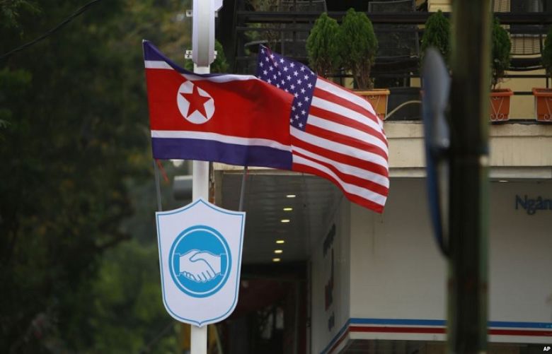 Flags of North Korea and the U.S are flown on a street in Hanoi, Vietnam, Feb. 19, 2019.